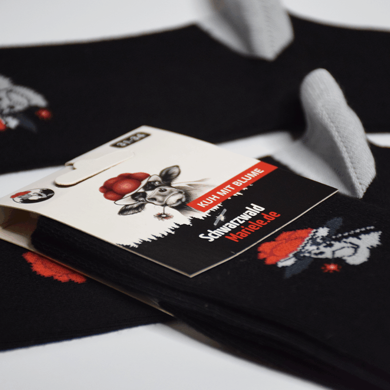 Socken Bollenhut Kuh mit Blume